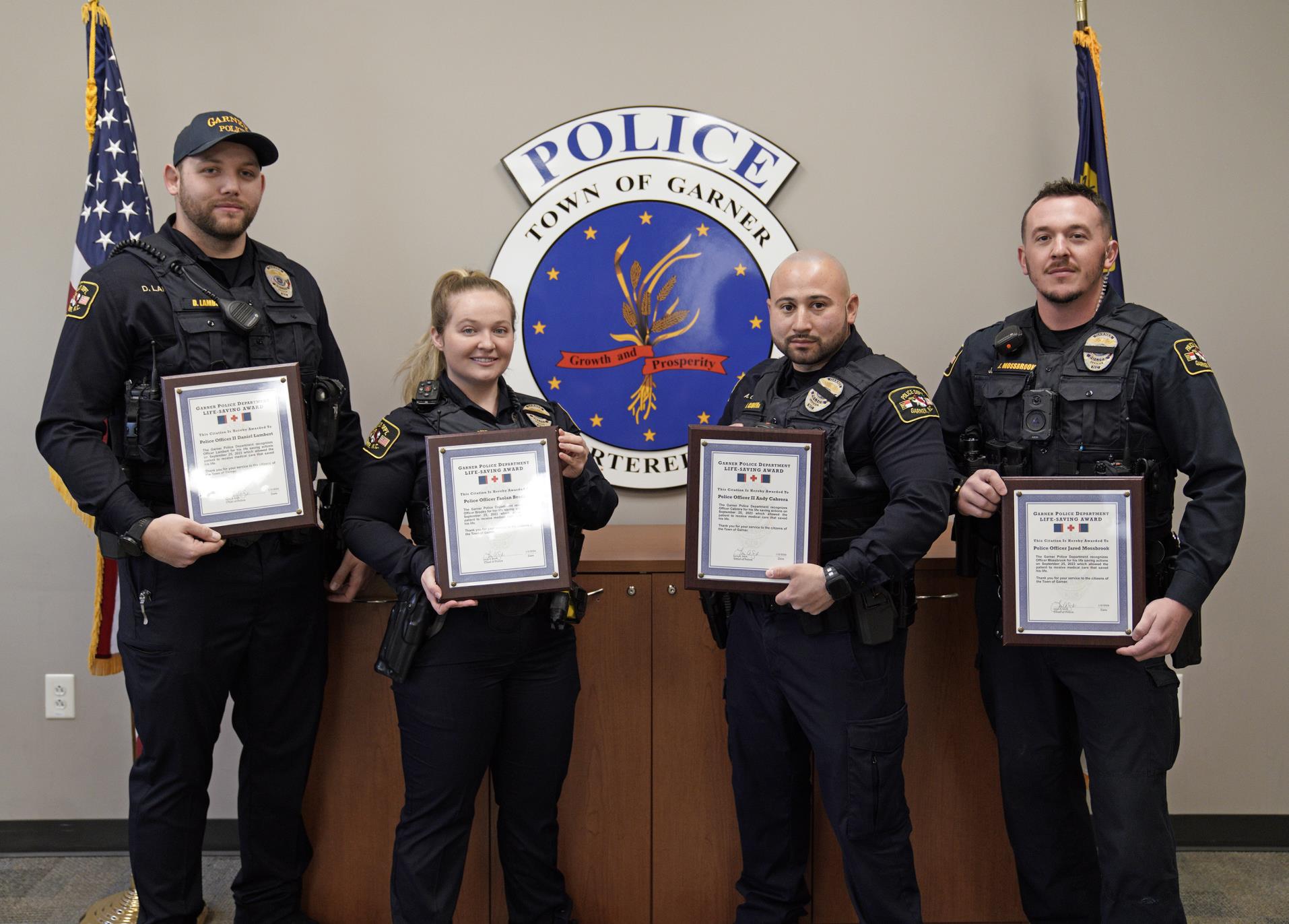 Officers receiving life-saving award